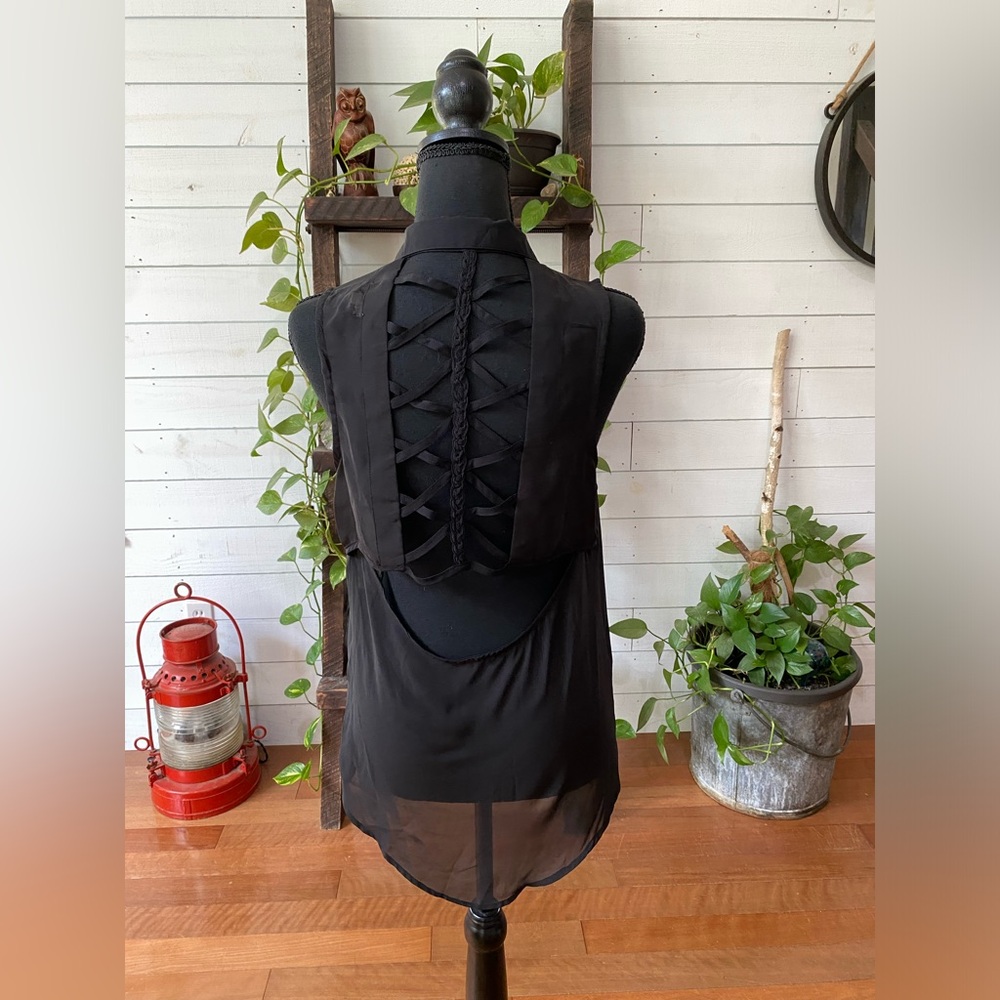 L8ter: Black Sheer Sleeveless Collared Blouse with a Cut Out Back